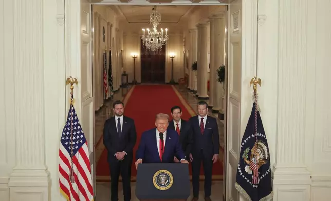 President Donald Trump speaks from the East Room of the White House in Washington, Saturday, June 21, 2025, after the U.S. military struck three Iranian nuclear and military sites, directly joining Israel's effort to decapitate the country's nuclear program, as Vice President JD Vance, Secretary of State Marco Rubio and Defense Secretary Pete Hegseth listen. (Carlos Barria/Pool via AP)