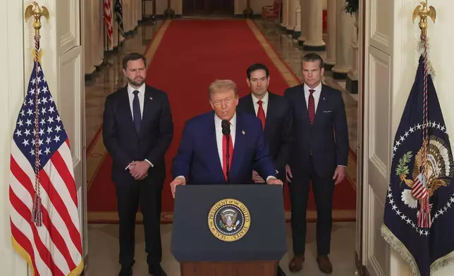 President Donald Trump speaks from the East Room of the White House in Washington, Saturday, June 21, 2025, after the U.S. military struck three Iranian nuclear and military sites, directly joining Israel's effort to decapitate the country's nuclear program, as Vice President JD Vance, Secretary of State Marco Rubio and Defense Secretary Pete Hegseth listen. (Carlos Barria/Pool via AP)
