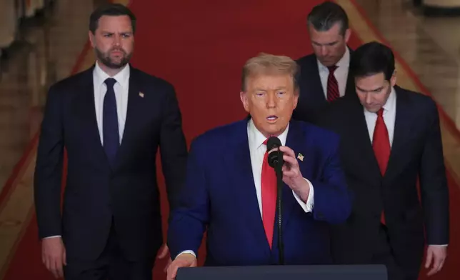 President Donald Trump speaks from the East Room of the White House in Washington, Saturday, June 21, 2025, after the U.S. military struck three Iranian nuclear and military sites, directly joining Israel's effort to decapitate the country's nuclear program, as Vice President JD Vance, Secretary of State Marco Rubio and Defense Secretary Pete Hegseth listen. (Carlos Barria/Pool via AP)