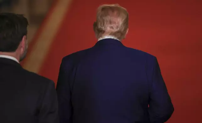 President Donald Trump departs after speaking from the East Room of the White House in Washington, Saturday, June 21, 2025, after the U.S. military struck three Iranian nuclear and military sites, directly joining Israel's effort to decapitate the country's nuclear program. (Carlos Barria/Pool via AP)