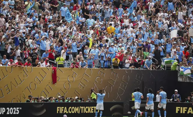 Manchester City players secelbaret after a goal during the Club World Cup group G soccer match between Manchester City and Wydad AC in Philadelphia, Wednesday, June 18, 2025. (AP Photo/Derik Hamilton)