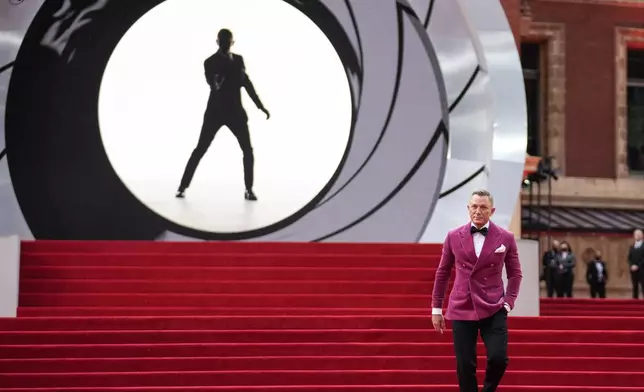 FILE - Daniel Craig appears at the premiere of the film "No Time To Die" in London on Sept. 28, 2021. (AP Photo/Matt Dunham, File)