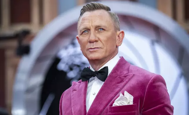 FILE - Daniel Craig appears at the world premiere of "No Time To Die'" in London on Sept. 28, 2021. (Photo by Joel C Ryan/Invision/AP, File)