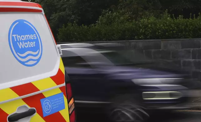 A Thames Water van is seen parked in London after British utility Thames Water says a U.S. investment firm has dropped a rescue bid for the debt-burdened company, Tuesday, June 3, 2025. (AP Photo/Kirsty Wigglesworth)