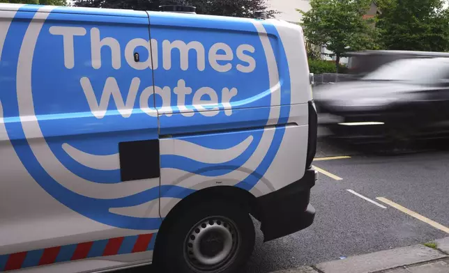 A Thames Water van is seen parked in London after British utility Thames Water says a U.S. investment firm has dropped a rescue bid for the debt-burdened company, Tuesday, June 3, 2025. (AP Photo/Kirsty Wigglesworth)