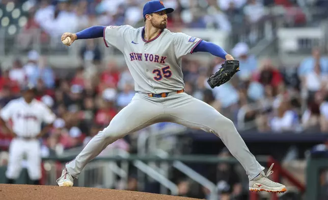 New York Mets pitcher Clay Holmes delivers in the second inning of a baseball game against the Atlanta Braves, Thursday, June 19, 2025, in Atlanta. (AP Photo/Colin Hubbard)