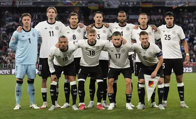 Germany players pose for the team picture ahead of the Nations League semifinal soccer match between Portugal and Germany at the Munich Football Arena, in Munich, Germany, Wednesday, June 4, 2025. (AP Photo/Matthias Schrader)
