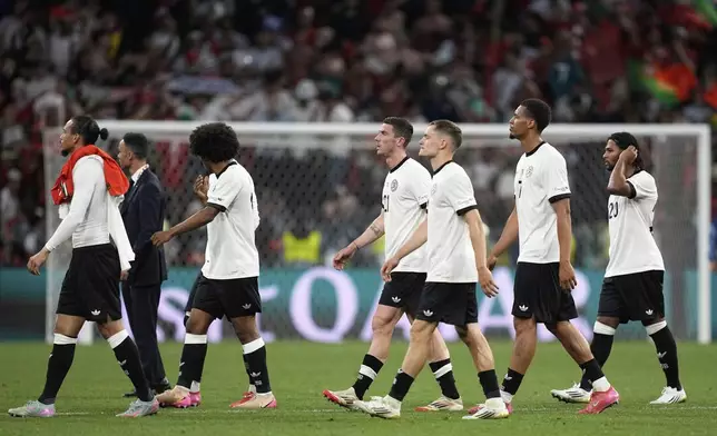 Germany players leave the field at the end of the Nations League semifinal soccer match between Portugal and Germany at the Munich Football Arena, in Munich, Germany, Wednesday, June 4, 2025. (AP Photo/Martin Meissner)