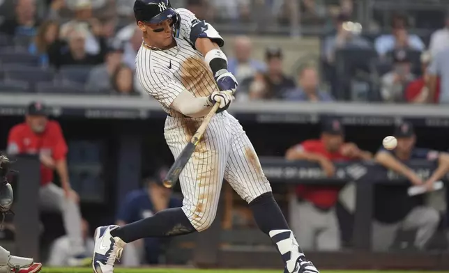 New York Yankees' Aaron Judge hits a single during the second inning of a baseball game against the Boston Red Sox, Friday, June 6, 2025, in New York. (AP Photo/Frank Franklin II)