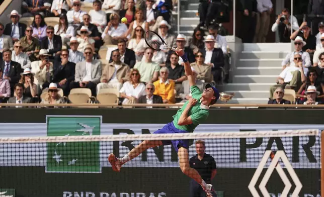 Italy's Jannik Sinner plays a shot against Spain's Carlos Alcaraz during their final match of the French Tennis Open at the Roland-Garros stadium in Paris, Sunday, June 8, 2025. (AP Photo/Lindsey Wasson)