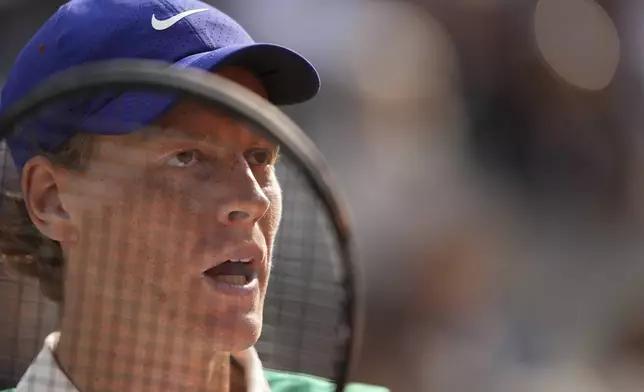 Italy's Jannik Sinner reacts as he plays against Spain's Carlos Alcaraz during their final match of the French Tennis Open at the Roland-Garros stadium in Paris, Sunday, June 8, 2025. (AP Photo/Thibault Camus)