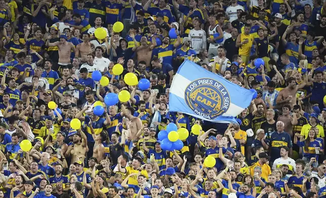 Boja Juniors fans cheer prior to the Club World Cup Group C soccer match between Bayern Munich and Boca Juniors in Miami Gardens, Fla., Friday, June 20, 2025. (AP Photo/Rebecca Blackwell)