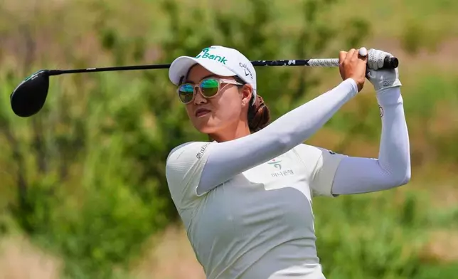Minjee Lee hits a tee shot on the second hole during the third round of the Women's PGA Championship golf tournament Saturday, June 21, 2025, in Frisco, Texas. (AP Photo/LM Otero)