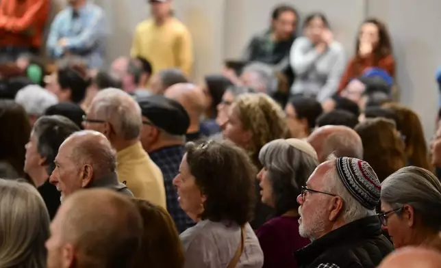 Attendees listen to speakers during a community vigil at the Boulder Jewish Community Center, Wednesday, June 4, 2025, in Boulder, Colo. (Andy Cross/The Denver Post via AP, Pool)