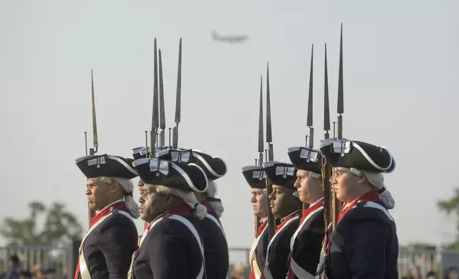 U.S. Army soldiers hold a performance as Washington's Continental Army during the Army Birthday Twilight Tattoo event at Joint Base Myer-Henderson Hall, Wednesday, June 11, 2025, in Fort Myer, Va. (AP Photo/Rod Lamkey, Jr.)