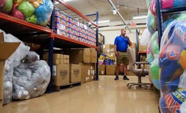 Playland's Castaway Cove vice president Brian Hartley browses the storage facility at Playland's Castaway Cove amusement park, in Ocean City, N.J, on Friday, June 6, 2025. (AP Photo/Mingson Lau)