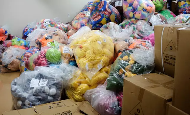 Bags of toy prizes at the Playland's Castaway Cove amusement park storage facility, in Ocean City, N.J, on Friday, June 6, 2025. (AP Photo/Mingson Lau)