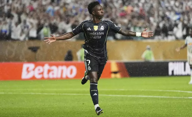 Real Madrid's Vinicius Junior celebrates after scoring his team's first goal during the Club World Cup Group H soccer match between Salzburg and Real Madrid in Philadelphia, Thursday, June 26, 2025. (AP Photo/Matt Slocum)