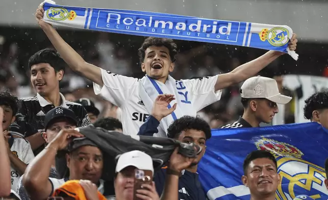 Fans react during the Club World Cup Group H soccer match between Salzburg and Real Madrid in Philadelphia, Thursday, June 26, 2025. (AP Photo/Matt Slocum)