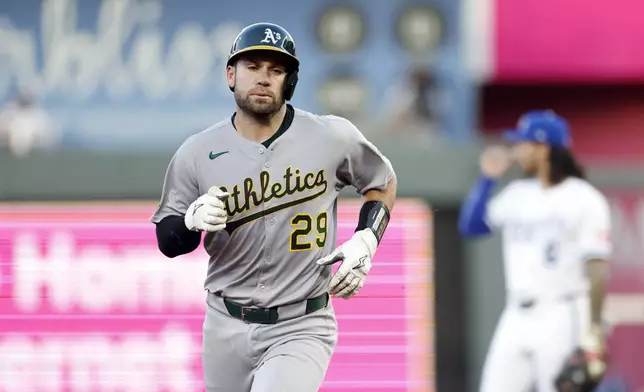 Athletics' Austin Wynns rounds the bases after hitting a home run during the second inning of a baseball game against the Kansas City Royals in Kansas City, Mo., Friday, June 13, 2025. (AP Photo/Colin E. Braley)