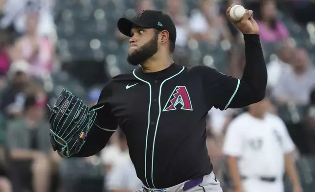 Arizona Diamondbacks starting pitcher Eduardo Rodriguez throws against the Chicago White Sox during the first inning of a baseball game in Chicago, Monday, June 23, 2025. (AP Photo/Nam Y. Huh)