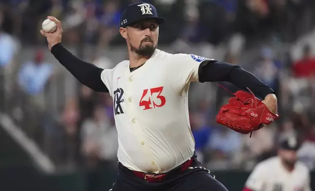 Texas Rangers starting pitcher Shawn Armstrong throws during the first inning of a baseball game against the Chicago White Sox, Friday, June 13, 2025, in Arlington, Texas. (AP Photo/LM Otero)