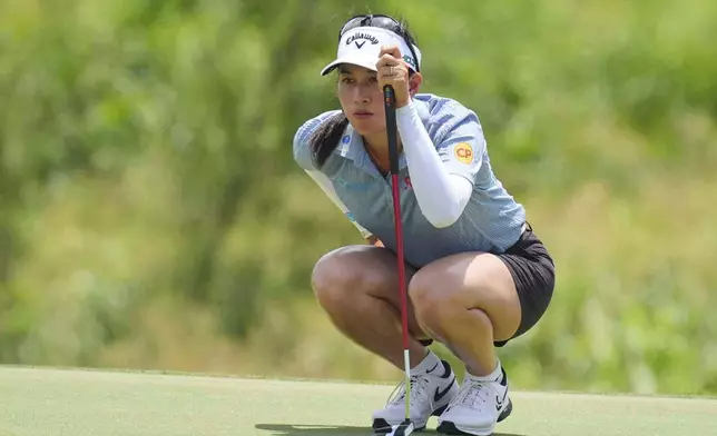 Jeeno Thitikul prepares to putt on the 10th hole during the second round of the Women's PGA Championship golf tournament Friday, June 20, 2025, in Frisco, Texas. (AP Photo/LM Otero)