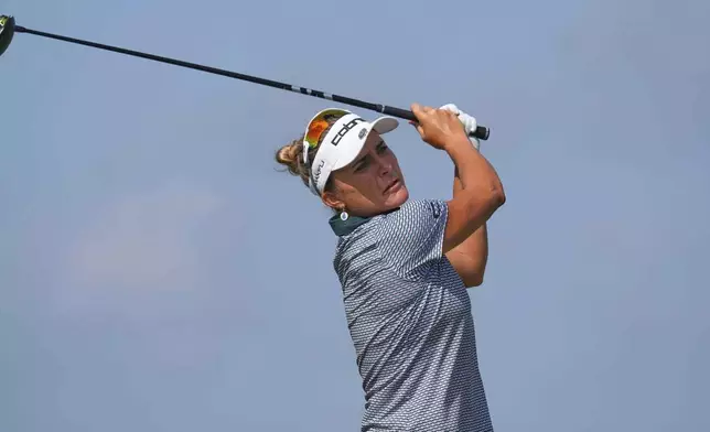 Lexi Thompson watches her tee shot on the sixth hole during the second round of the Women's PGA Championship golf tournament Friday, June 20, 2025, in Frisco, Texas. (AP Photo/LM Otero)