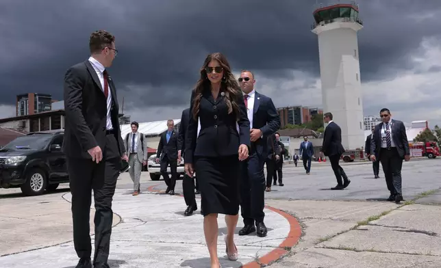 U.S. Homeland Security Secretary Kristi Noem walks to a waiting plane after touring the Department of Homeland Security operations at La Aurora International Airport, in Guatemala City, Thursday, June 26, 2025. (Anna Moneymaker/Pool Photo via AP)