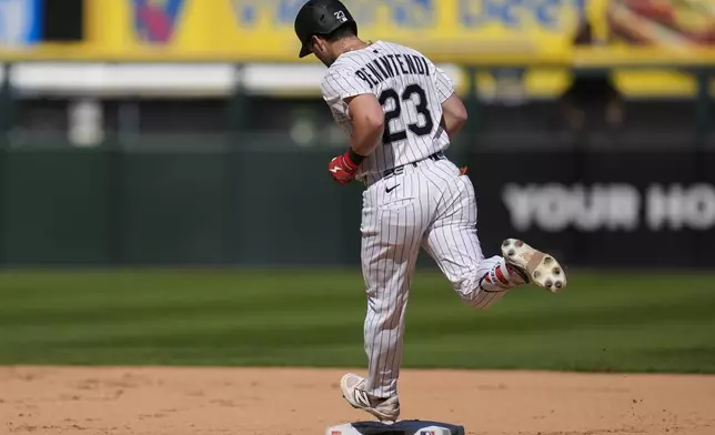Chicago White Sox's Andrew Benintendi (23) runs the bases after hitting a solo home run during the sixth inning of a baseball game against the San Francisco Giants, Saturday, June 28, 2025, in Chicago. (AP Photo/Erin Hooley)