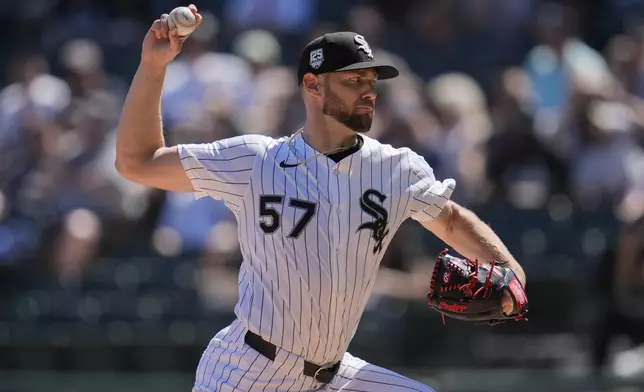 Chicago White Sox starting pitcher Adrian Houser (57) throws against the San Francisco Giants during the first inning of a baseball game Saturday, June 28, 2025, in Chicago. (AP Photo/Erin Hooley)