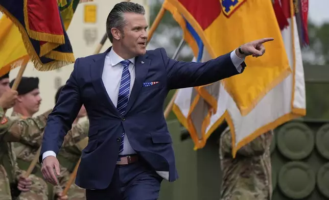 Defense Secretary Pete Hegseth arrives to speak before President Donald Trump at Fort Bragg, Tuesday, June 10, 2025, in Fort Bragg, N.C. (AP Photo/Alex Brandon)
