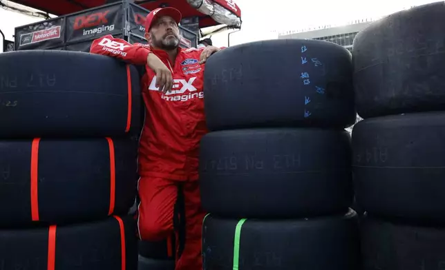 A crew member for driver Josh Berry watches during a NASCAR Cup Series auto race, Saturday, June 28, 2025, in Hampton, Ga. (AP Photo/Butch Dill)