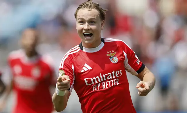 Benfica's Andreas Schjelderup celebrates after scoring during the Club World Cup Group C soccer match between Benfica and Bayern Munich in Charlotte, N.C., Tuesday, June 24, 2025. (AP Photo/Nell Redmond)