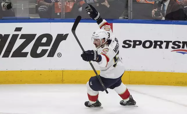 Florida Panthers' Brad Marchand (63) celebrates a goal against the Edmonton Oilers during the second period in Game 2 of the NHL hockey Stanley Cup Finals in Edmonton, Alberta, Friday, June 6, 2025. (Jason Franson/The Canadian Press via AP)