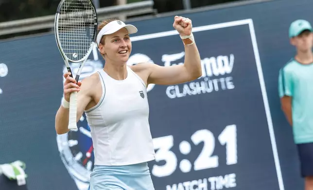 Russia's Ludmilla Samsonova celebrates winning her match against USA's Jessica Pegula at the end of their women's singles match of the Berlin WTA tennis tournament in Berlin, Germany, Wednesday, June 18, 2025. (Andreas Gora/dpa via AP)