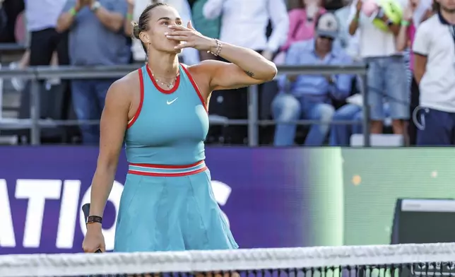 Belarus' Aryna Sabalenka celebrates winning against Kazakhstan's Elena Rybakina in their women's singles quarterfinal match of the Berlin WTA tennis tournament, in Berlin, Friday, June 20, 2025. (Andreas Gora/dpa via AP)