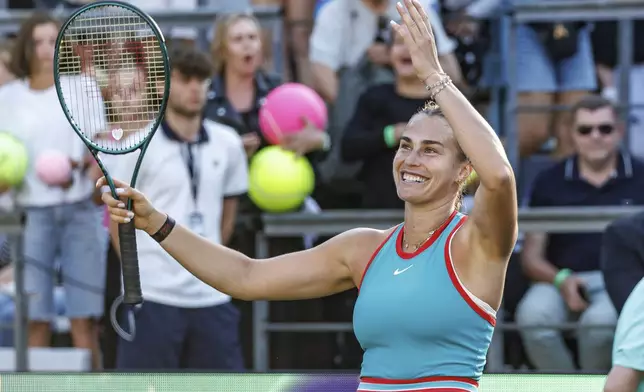 Belarus' Aryna Sabalenka celebrates winning against Kazakhstan's Elena Rybakina, during their women's singles quarterfinal match of the Berlin WTA tennis tournament, in Berlin, Friday, June 20, 2025. (Andreas Gora/dpa via AP)