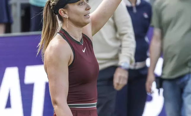 Spain's Paula Badosa celebrates defeating Germany's Eva Lys during the Berlin WTA tennis tournament in Berlin, Germany, Monday, June 16, 2025. (Andreas Gora/dpa via AP)