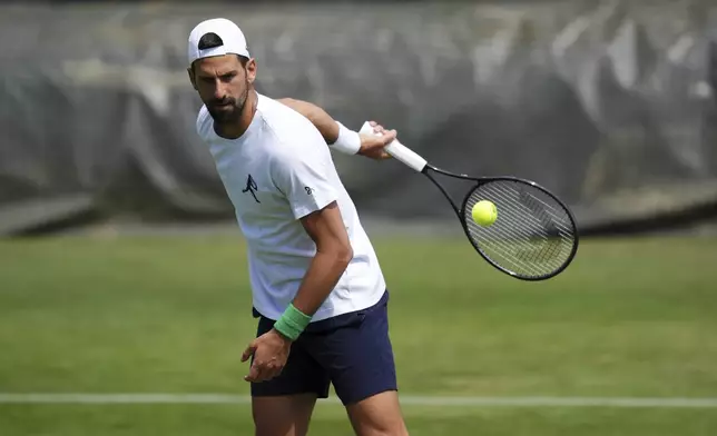 Novak Djokovic during a practice session at the All England Lawn Tennis and Croquet Club in Wimbledon ahead of the Wimbledon Championships, Friday June 27, 2025. (John Walton/PA via AP)