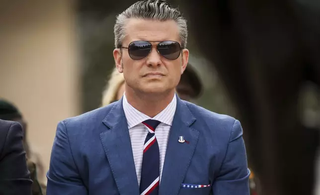 U.S. Defense Secretary Pete Hegseth attends a ceremony at the US cemetery to commemorate the 81st anniversary of the D-Day landings, Friday, June 6, 2025 in Colleville-sur-Mer, Normandy. (AP Photo/Thomas Padilla)