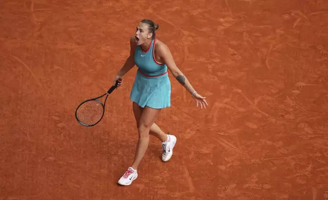 Aryna Sabalenka of Belarus reacts during the final match of the French Tennis Open at the Roland-Garros against United States' Coco Gauff in Paris, Saturday, June 7, 2025. (AP Photo/Lindsey Wasson)