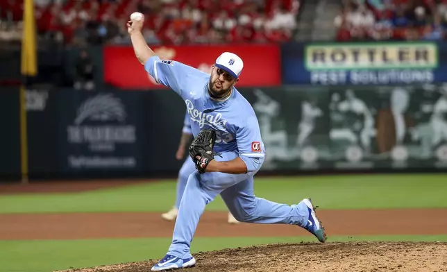 Kansas City Royals pitcher Carlos Estévez throws during the ninth inning in the second game of a baseball doubleheader against the St. Louis Cardinals, Thursday, June 5, 2025, in St. Louis. (AP Photo/Scott Kane)