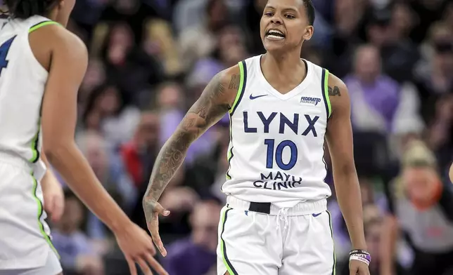 Courtney Williams (10) celebrates a 3-point shot in the second half as the Golden State Valkyries played the Minnesota Lynx at Chase Center in San Francisco, on Sunday, June 1, 2025. (Carlos Avila Gonzalez/San Francisco Chronicle via AP)