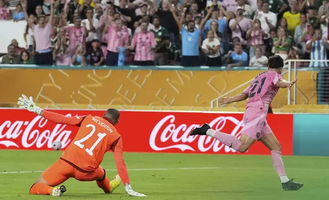 Inter Miami's Tadeo Allende celebrates after scoring past Palmeiras goalie Weverton during the Club World Cup Group A soccer match between Inter Miami and Palmeiras in Miami Gardens, Fla., Monday, June 23, 2025. (AP Photo/Marta Lavandier)