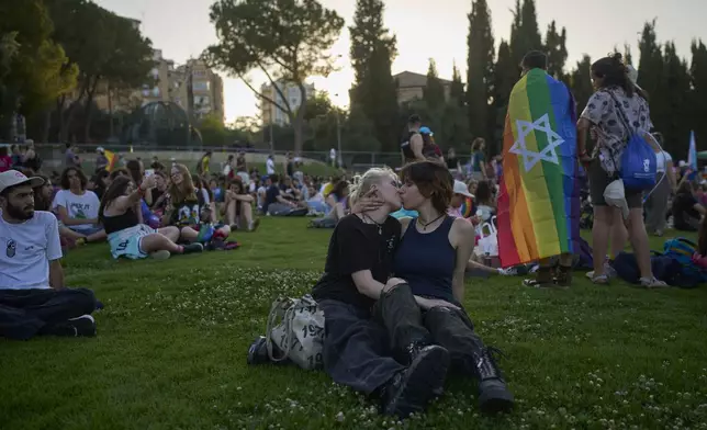 People participate in the annual Pride parade in Jerusalem, Thursday, June 5, 2025. (AP Photo/Ohad Zwigenberg)