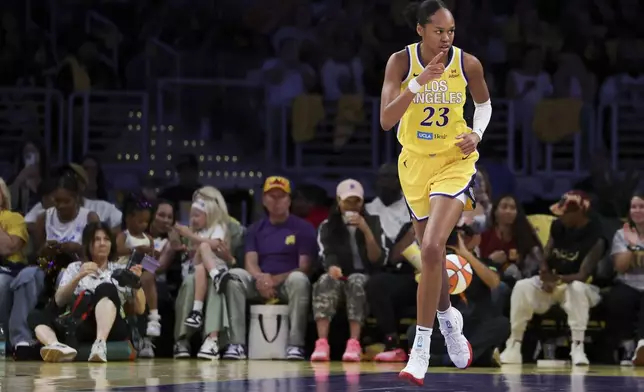 Los Angeles Sparks forward Azura Stevens (23) gestures after scoring against the Chicago Sky during the first half of a WNBA basketball game, Sunday, June 29, 2025, in Los Angeles. (AP Photo/Jessie Alcheh)