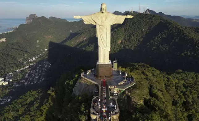 A Mass celebrating the Catholic holiday of Corpus Christi is held at the Christ the Redeemer statue in Rio de Janeiro, Thursday, June 19, 2025 (AP Photo/Bruna Prado)