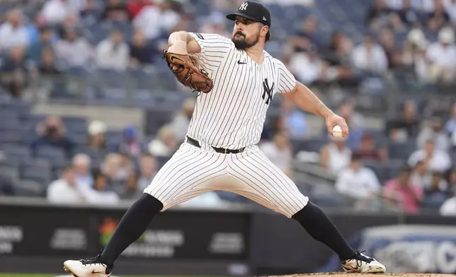 New York Yankees' Carlos Rodón pitches during the first inning of a baseball game against the Cleveland Guardians, Tuesday, June 3, 2025, in New York. (AP Photo/Frank Franklin II)