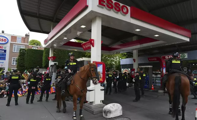Police block demonstrators who are protesting against the NATO summit in The Hague, Netherlands, Wednesday, June 25, 2025. (AP Photo/Peter Dejong)